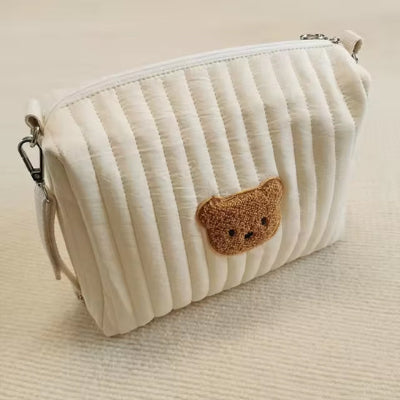 TROUSSE DE TOILETTE BEBE-SPATIEUSE ET PRATIQUE